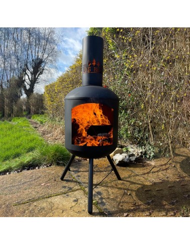 Steel chiminea assembled in garden setting