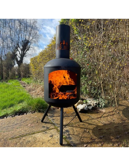 Steel chiminea assembled in garden setting